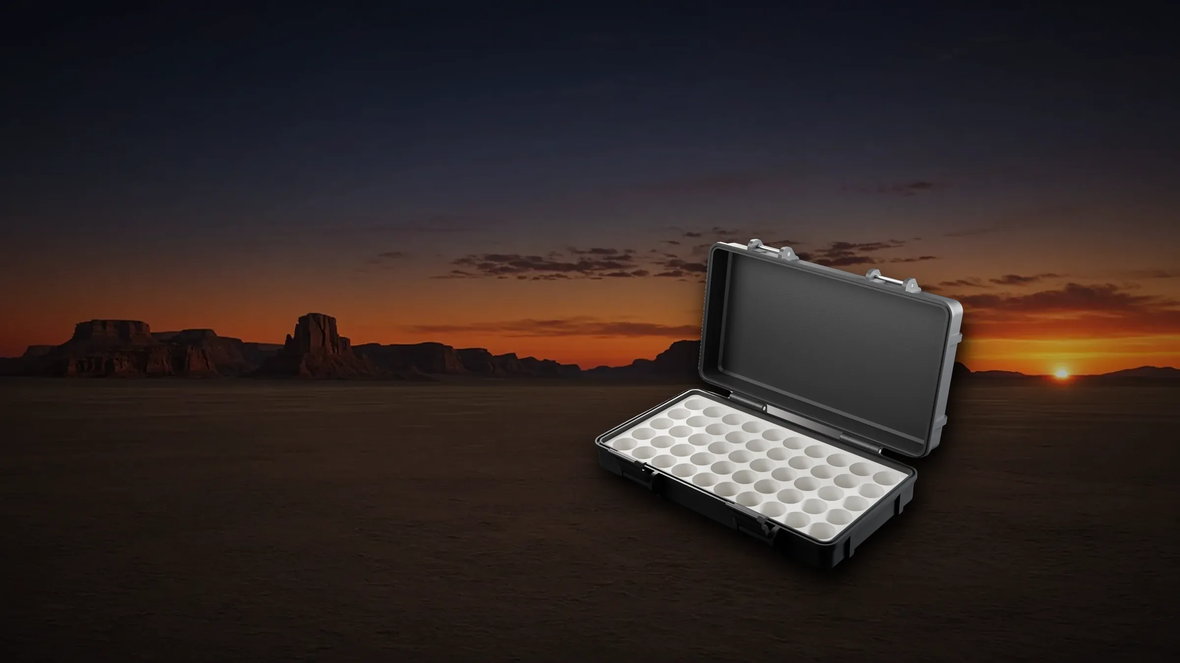 Open 100-slot vial case in bronze at dawn on a Texas horizon